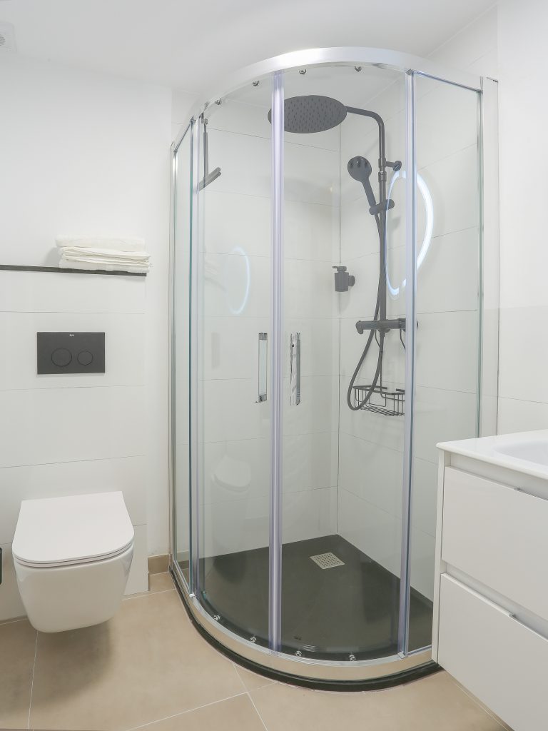 Bathroom with shower cabin at apartment Alquería Sol in Dénia