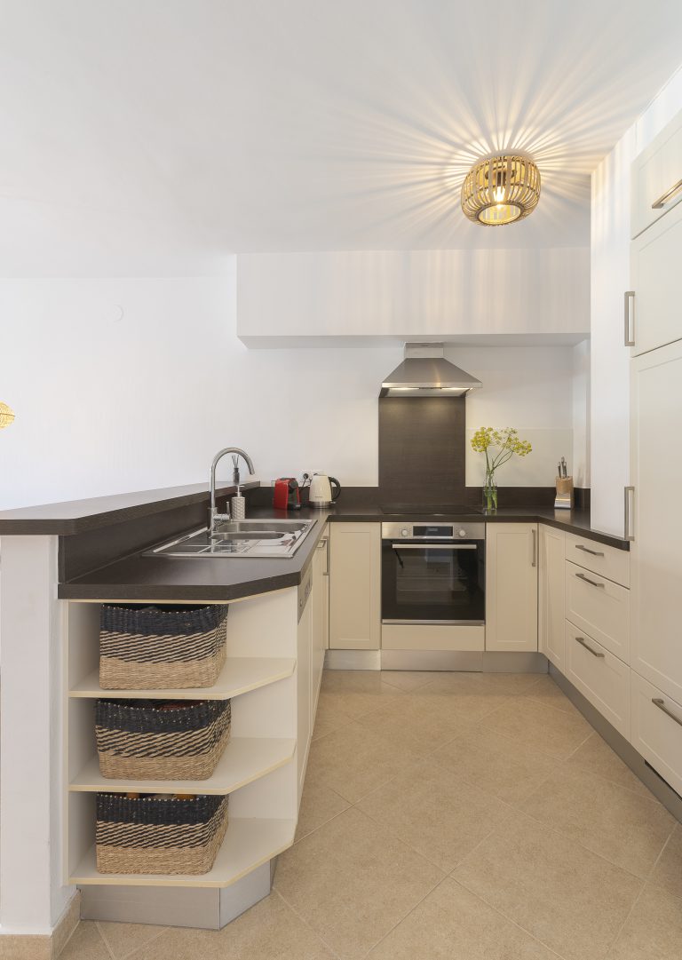 Kitchen with appliances at apartment Retiro Sol A1 in Dénia