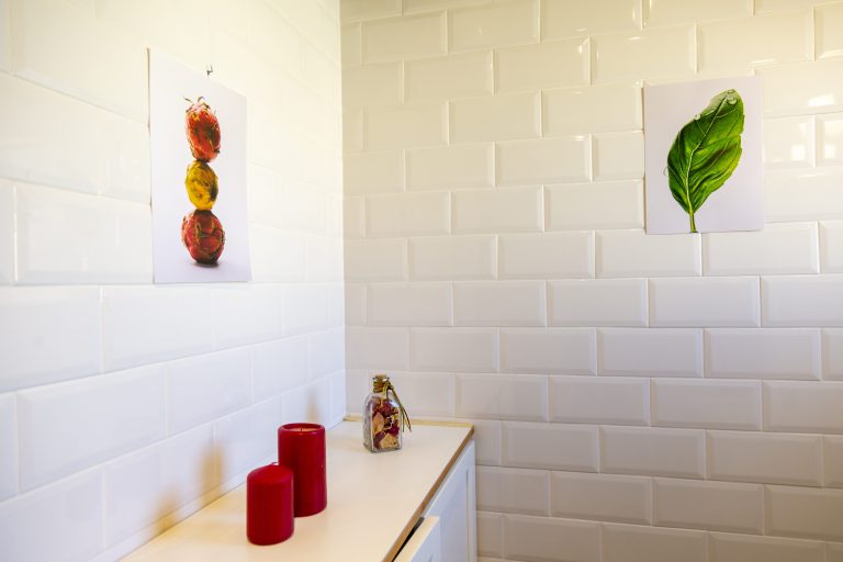 Bathroom shelf with decorative items at apartment Retiro Sol A05 in Dénia