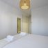Bedroom with window in Casa Valys villa